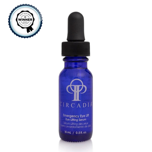 Emergency Eye Lift serum in a blue bottle with dropper, awarded for its effectiveness in eye lifting.