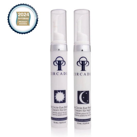 Full Circle Eye Repair Day and Night Creams in applicator bottles with award badge.