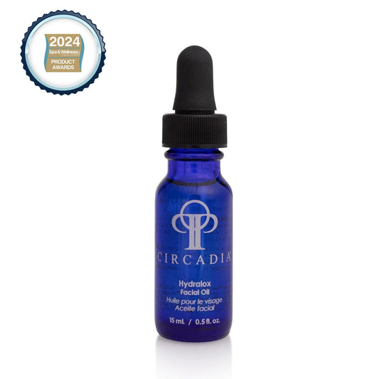 Hydralox Facial Oil in blue bottle with dropper from Circadia, designed for deep hydration and moisture retention.