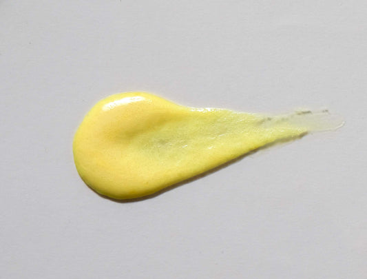 Retinol 2% Exfoliating Scrub/Mask texture swatch showing yellow creamy consistency for radiant glowing complexion