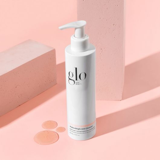 Hydra-Bright AHA Cleanser by Glo Skin Beauty - sulfate-free foaming gel cleanser for hydrating, brightening, and removing makeup.
