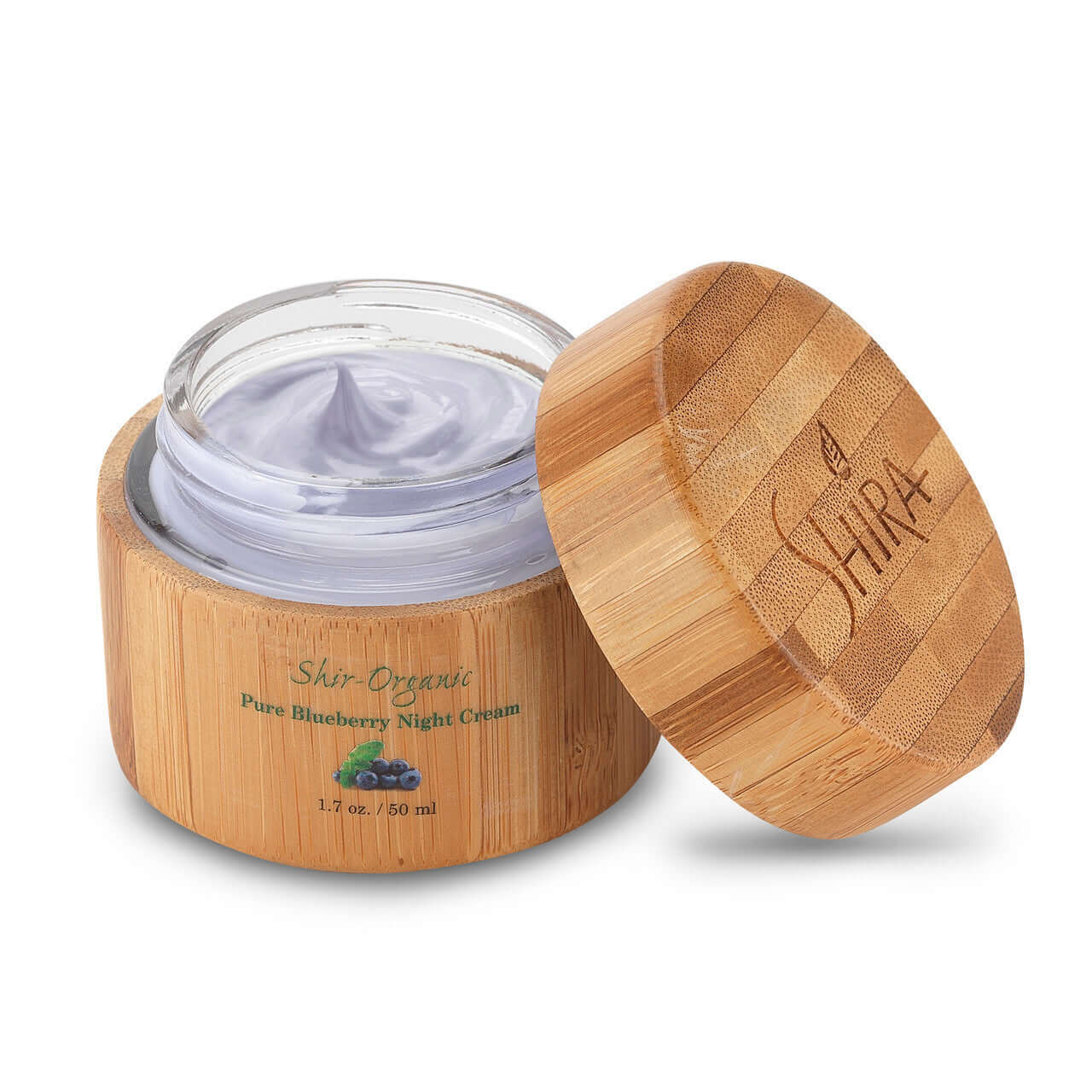 Pure Blueberry Night Cream in bamboo container with lid slightly open, showcasing the cream's rich, hydrating formula for smooth, supple skin.