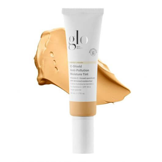 C-Shield Anti-Pollution Moisture Tint SPF 30 tube with beige swatch in background.