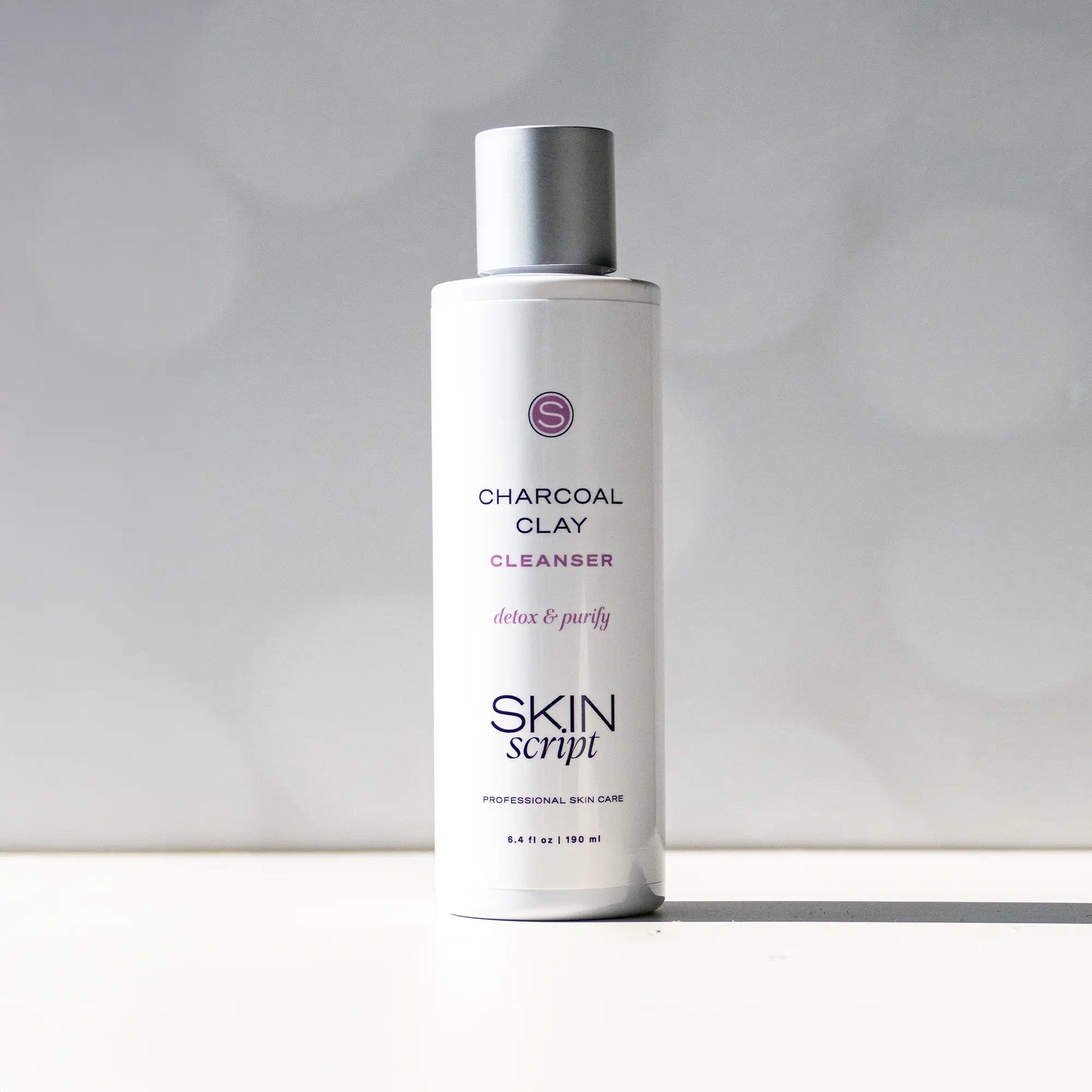 Charcoal Clay Cleanser with Kaolin for detoxifying and purifying skin, absorbs sebum, removes impurities, and prevents clogged pores.