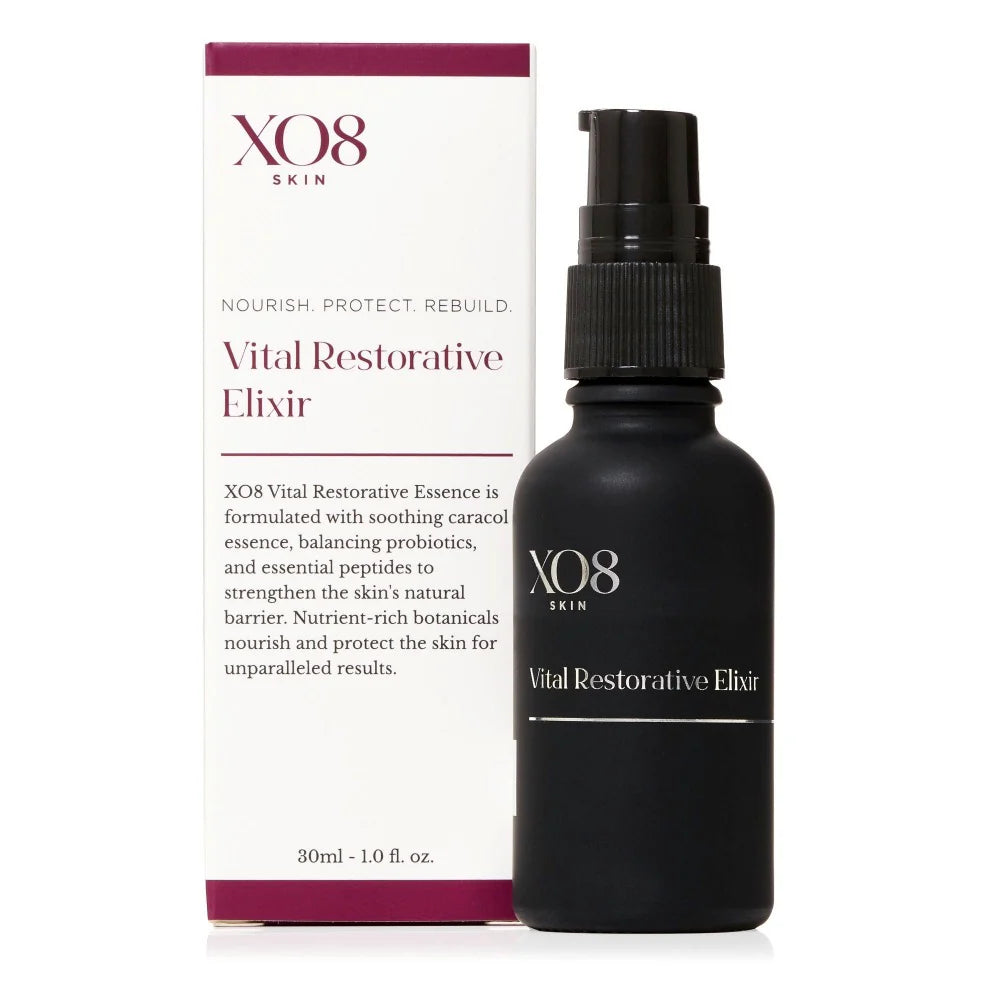 Vital Restorative Elixir (1oz) by XO8, nourishing and skin-rebuilding formula in a sleek black bottle.