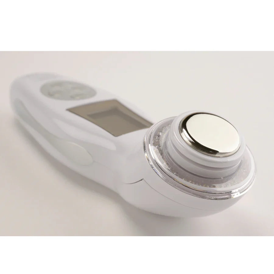 The Wave device combining ultrasound, vibrations, and LED for anti-aging, toning, and enhanced product penetration.