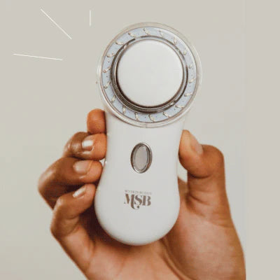 MYSKINBUDDY Boost handheld device showcasing its innovative design and features for facial treatments.