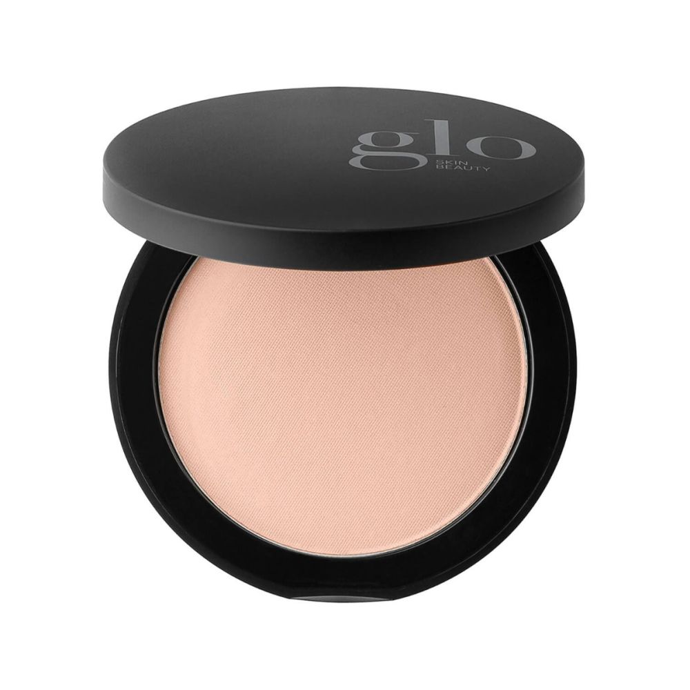 Pressed powder foundation in a black compact case for natural, longwearing coverage.