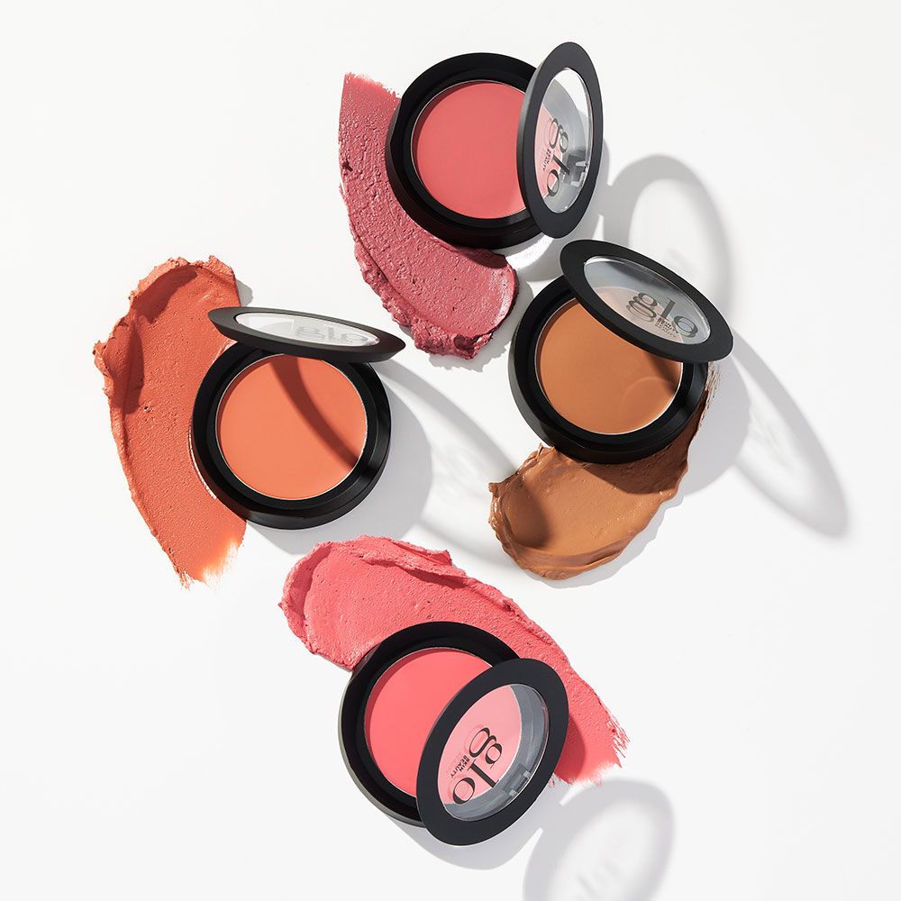 Four shades of mineral cream blushes with swatches, showcasing the vibrant, buildable colors for cheeks, lids, and lips.