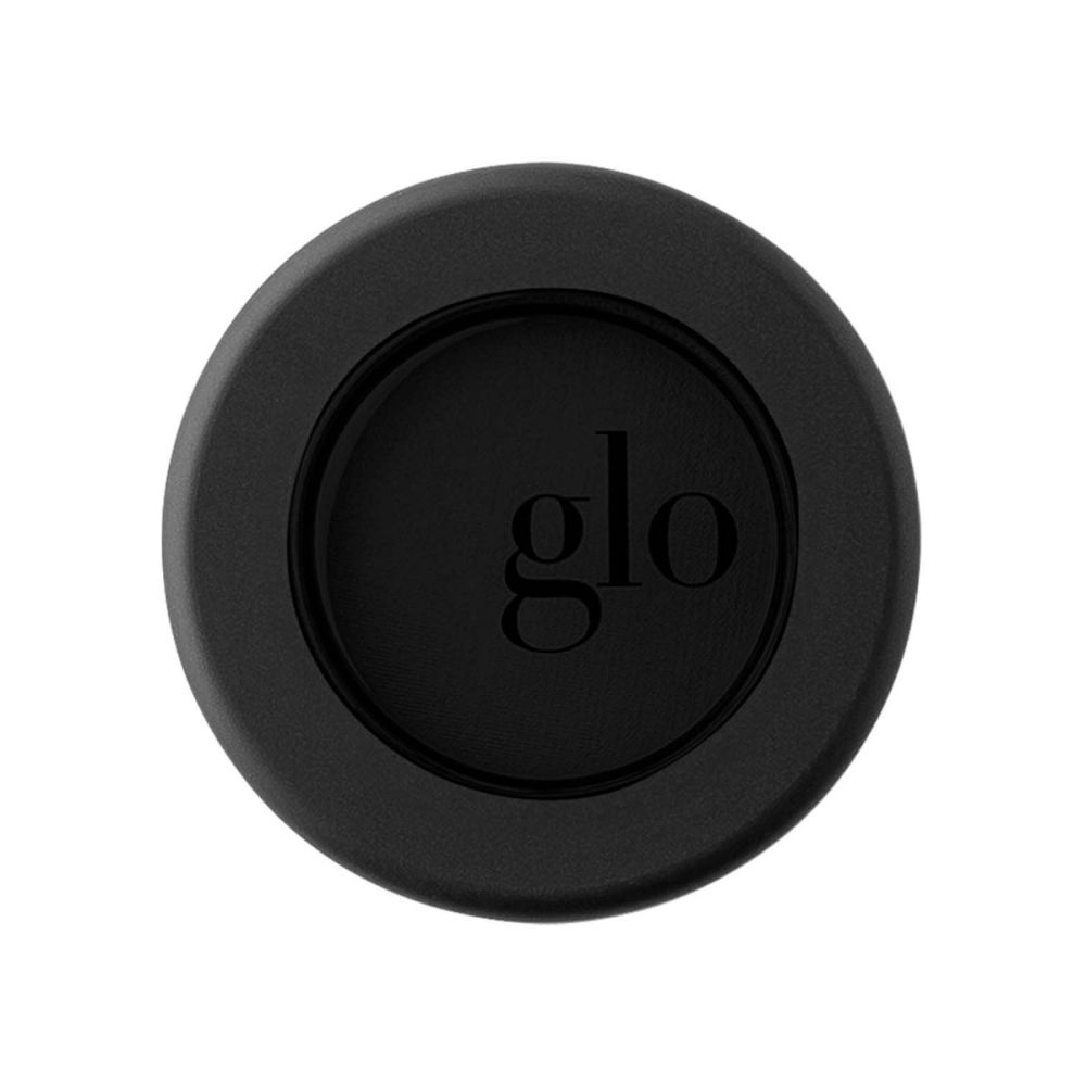 Glossy mineral eyeshadow single in sleek black packaging with "glo" logo.