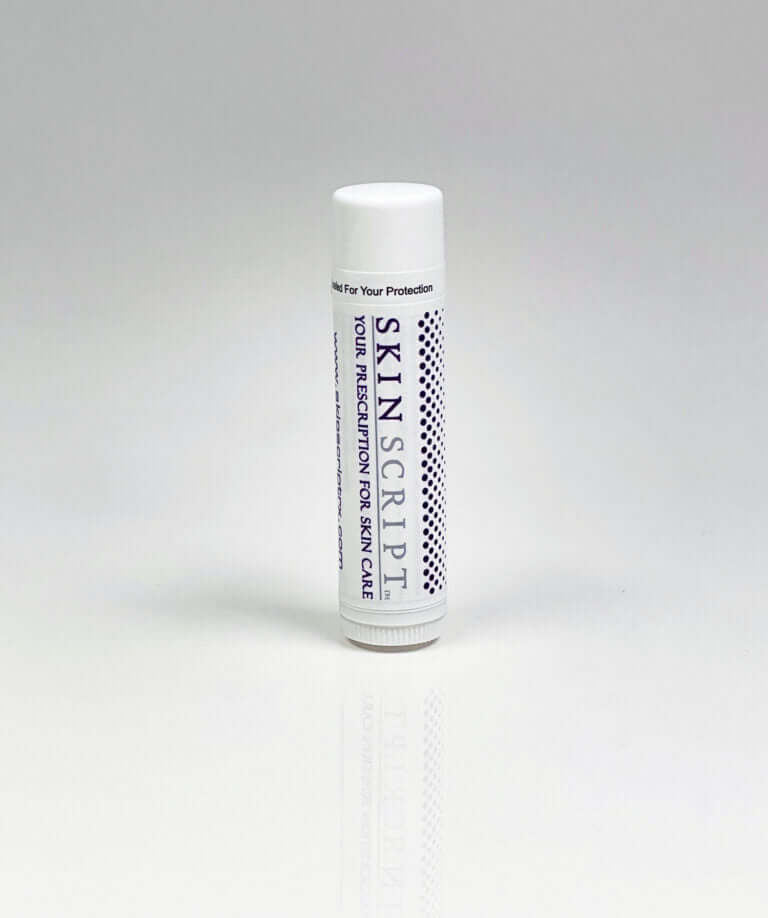 Skin Script lip balm with SPF 15 protection and tropical punch flavor for UV defense against harmful rays.