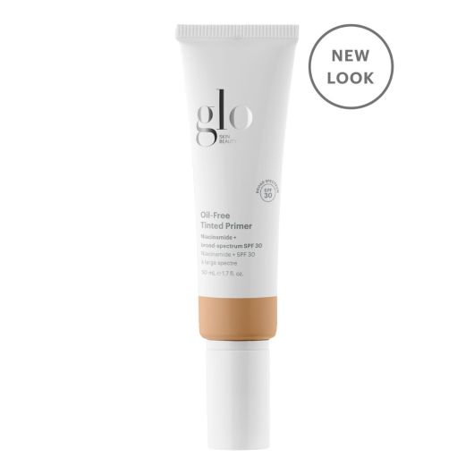 Oil-Free Tinted Primer SPF 30 tube with new packaging, offering sheer coverage, primer, and broad-spectrum sunscreen for a perfect complexion.