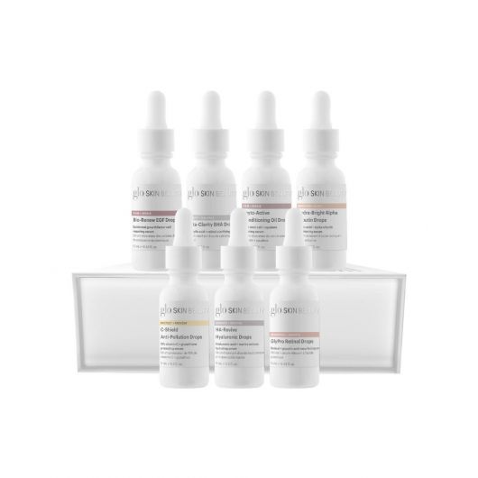 The Solutions Serum Set V2 featuring seven targeted treatment serums in smart dropper bottles for personalized skincare solutions.