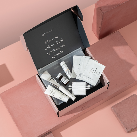 Glo Skin Beauty Retinol + C Smoothing Peel in a Box, complete at-home peel kit with professional-level skincare products and accessories.